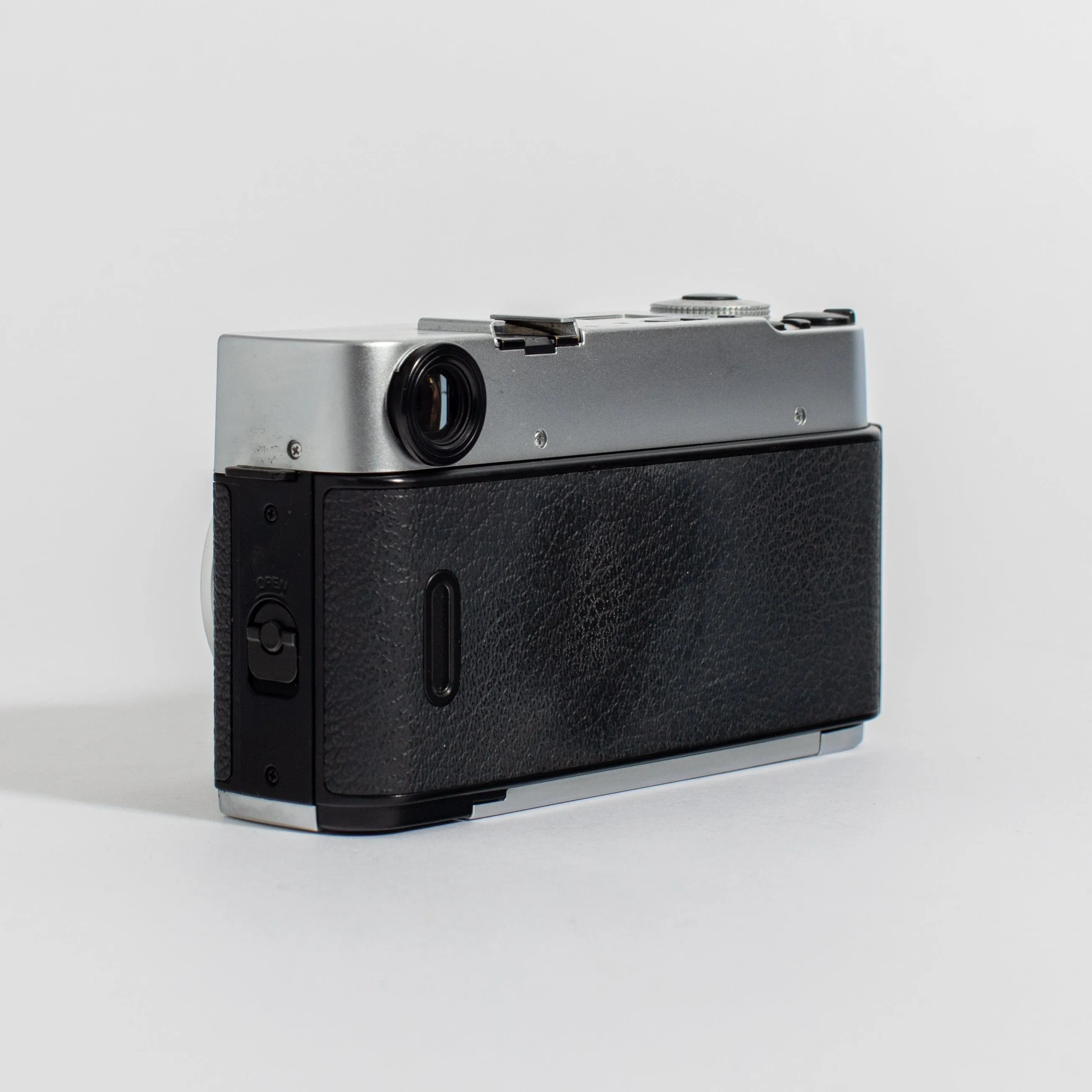 Konica Hexar Silver with 35mm f2 lens, leather case, and strap