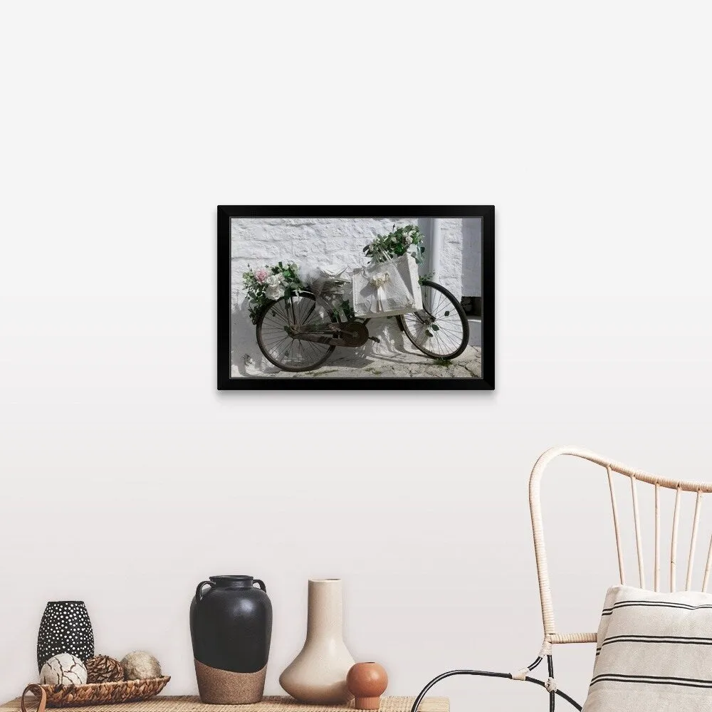 "Bicycle parked against a wall, Trulli House, Alberobello, Apulia, Italy" Black Framed Print