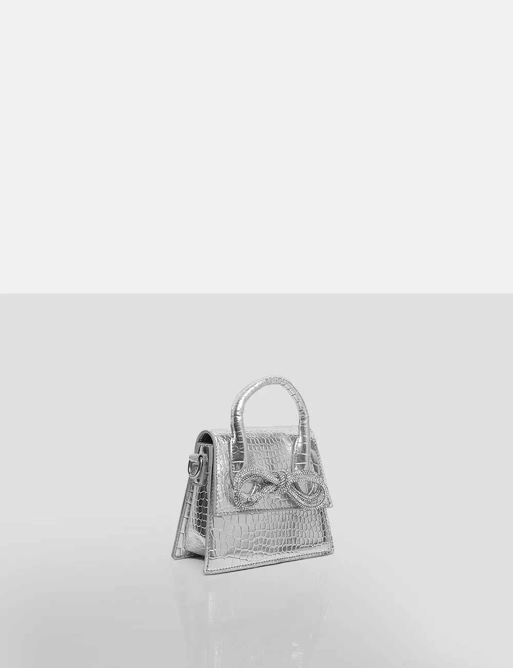 The Indy Silver Croc Pu Diamante Bow Mini Bag